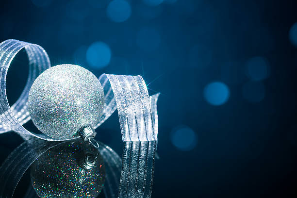 istock Silver Blue Christmas Decoration - Bauble Ribbon Defocused Background 453937487