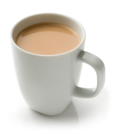 Mug of tea with milk on a white background.