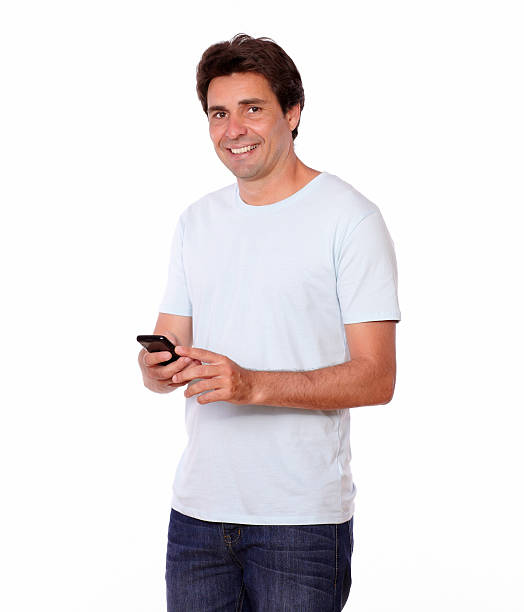 istock Charming male sending a message on cellphone 453943611