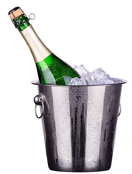 istock bottle of champagne in ice bucket 453944257
