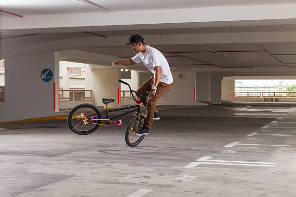 istock BMX Bicycle rider doing his stunt 453944761