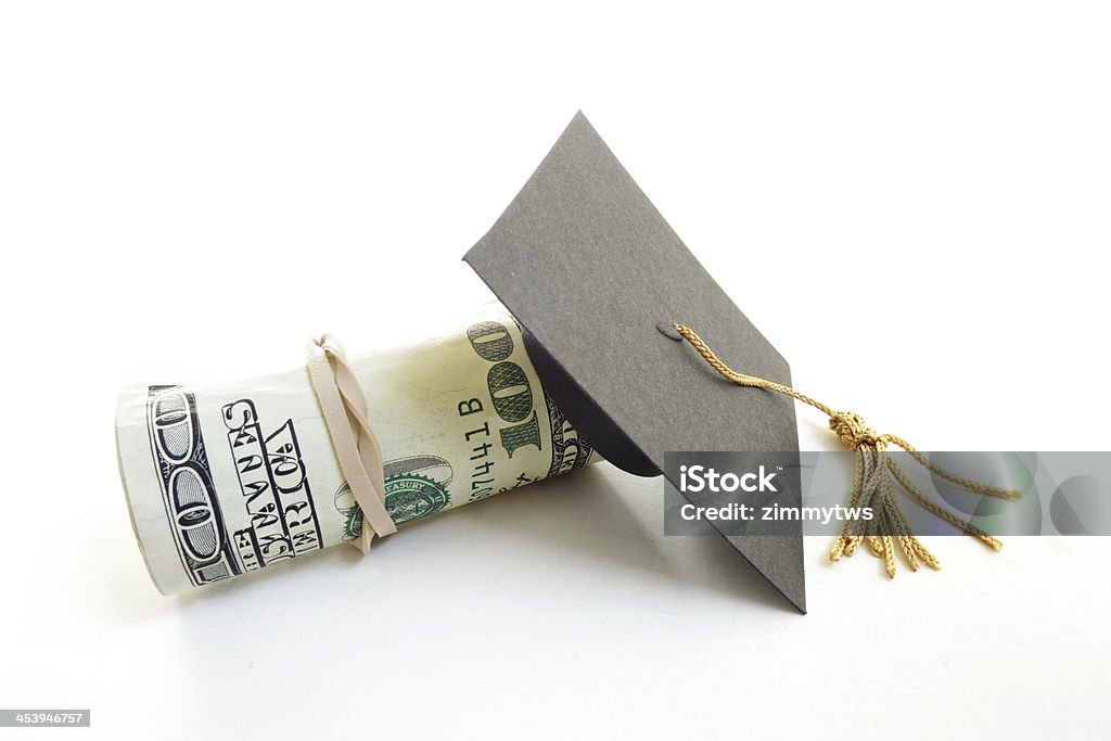 Cappuccio e denaro - Foto stock royalty-free di Aiuti finanziari per studenti