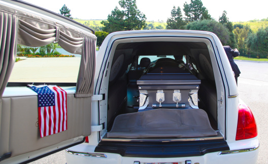 Coffin inside a hearse at a funeral