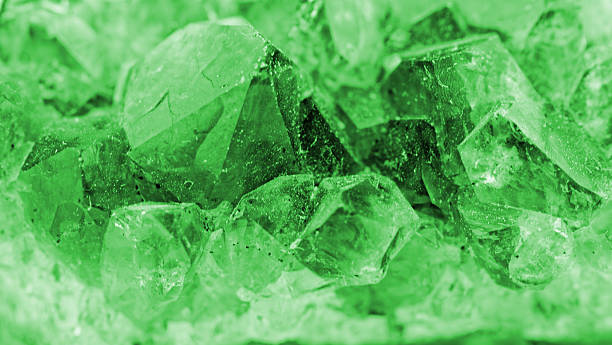 istock crystal macro photo in emerald color 453952951