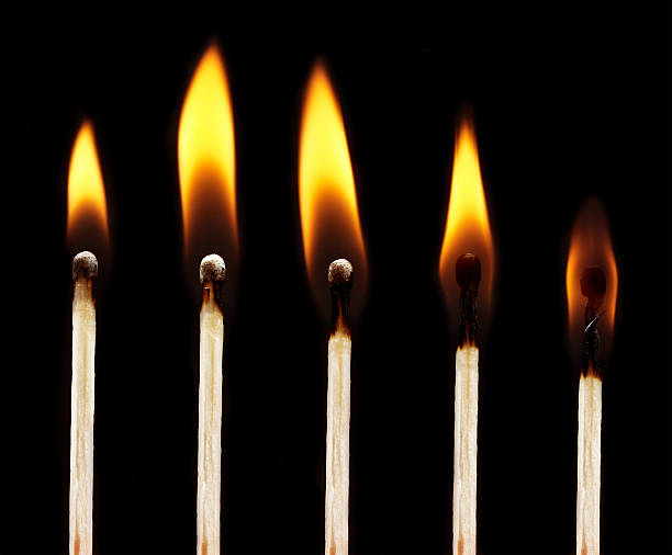 istock set of burning matchsticks on black background 453953201