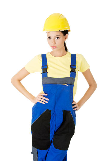 istock Attractive woman wears work clothes and helmet. 453956507