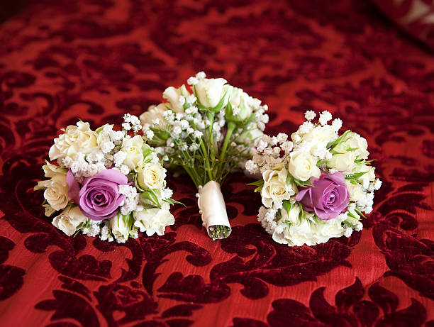 Wedding bouquet arranged on a flowral themed carpet