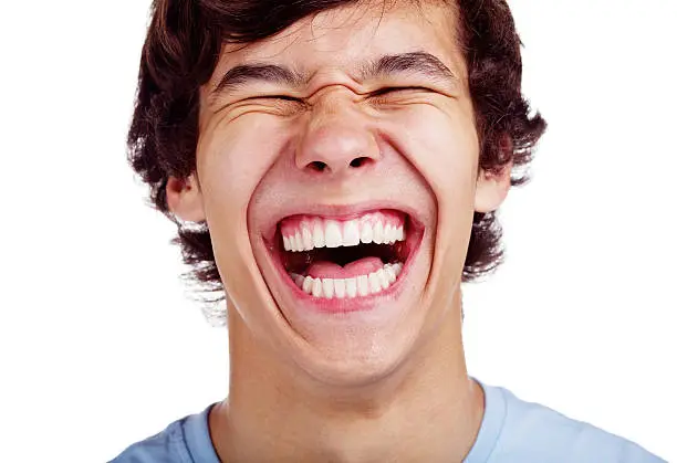 Photo of Happy teenage laugh closeup