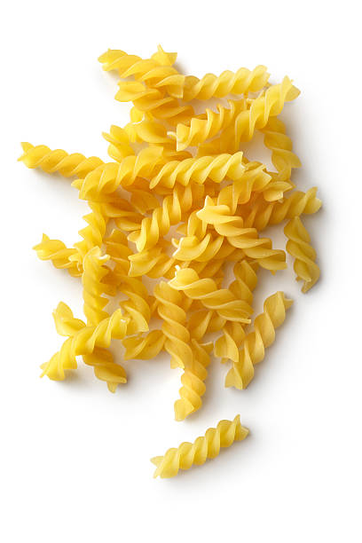 ingredienti italiani: fusilli - italian cuisine dry pasta directly above foto e immagini stock
