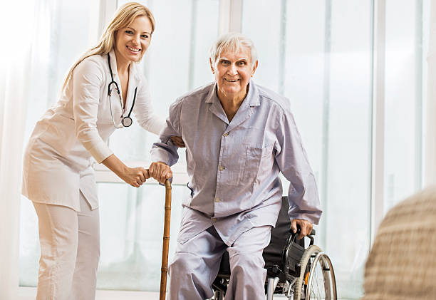 istock Happy doctor with a senior patient. 453961587