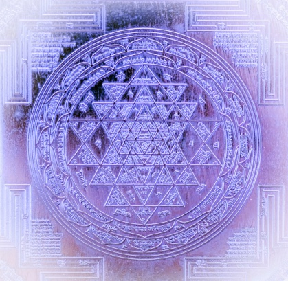 Macro photo of silver Sri Yantra.  Selective focus. Toned photo.