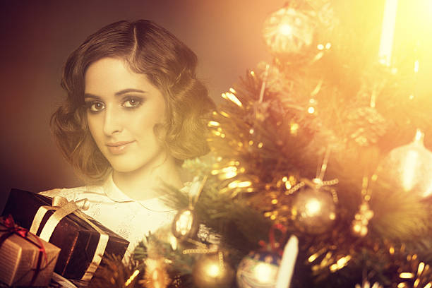 istock girl holding christmas gift 453962117