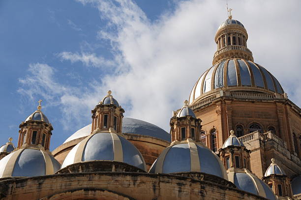 MOSTA, MALTA - MAY 22, 2015: The Mosta dome church in Malta, also known as the miracle church after a 50 kilo bomb smashed through the dome and failed to detonate in 1942