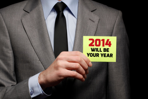 Businessman Holding Paper with New Year Message