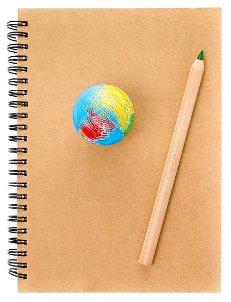 istock School Globe and recycle craft  notebook  on white background. 453978121
