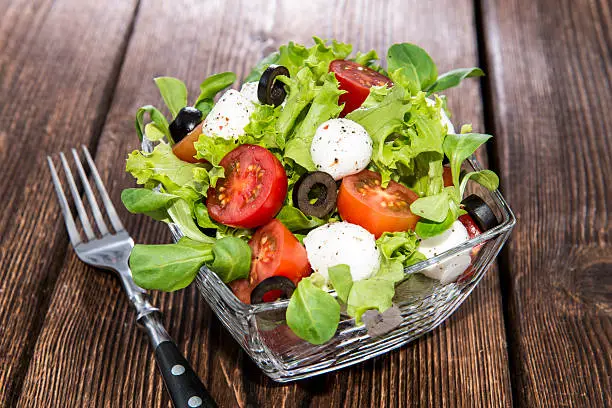 Portion of fresh and healthy Tomato-Mozzarella Salad