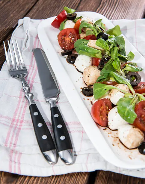 Tomato-Mozzarella Salad with Balsamic Vinegar on a plate