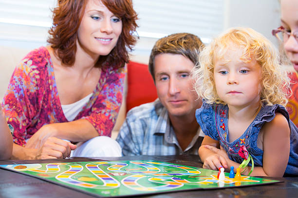 istock Happy family about to start an exciting board game 453987443