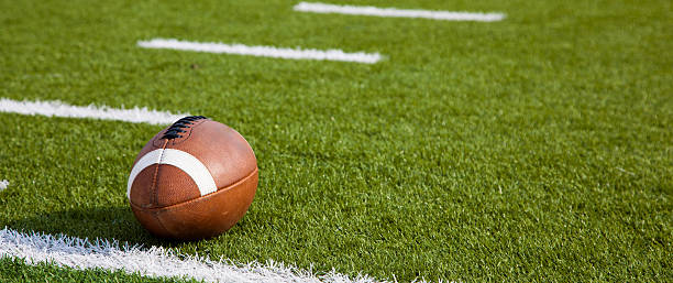 istock An American football on field 453992707