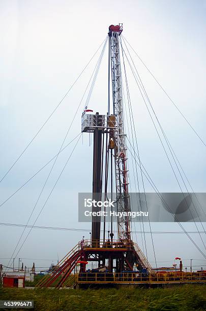 Oil Derrick Stock Photo - Download Image Now - Blue, Construction Frame, Crude Oil