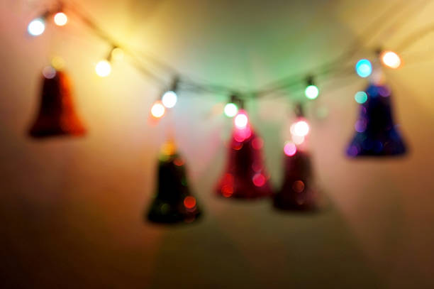 Defocused of Christmas bells with light at night