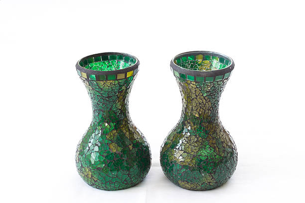 Green vases made of small pieces of glass - isolated on white