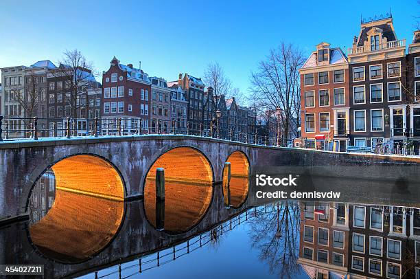 Bridge Lights Reflection Stock Photo - Download Image Now - Amsterdam, Winter, Cycling