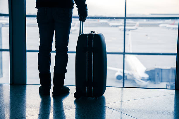istock Traveler silhouettes at airport,Beijing 454030949