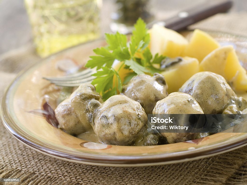 Meatballs Meatballs with sauce and boiled potatoes, selective focus Beef Stock Photo