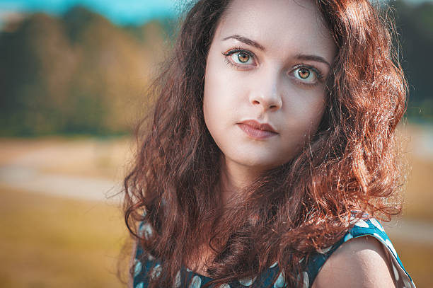 istock Beautiful young woman portrait 454033715