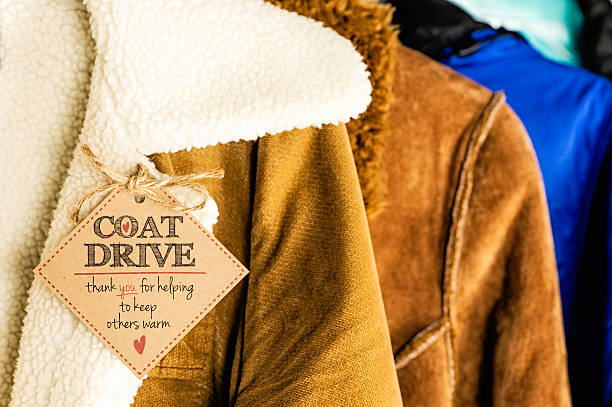 Coat Drive Promotion Coat Drive Promotion coat stock pictures, royalty-free photos & images