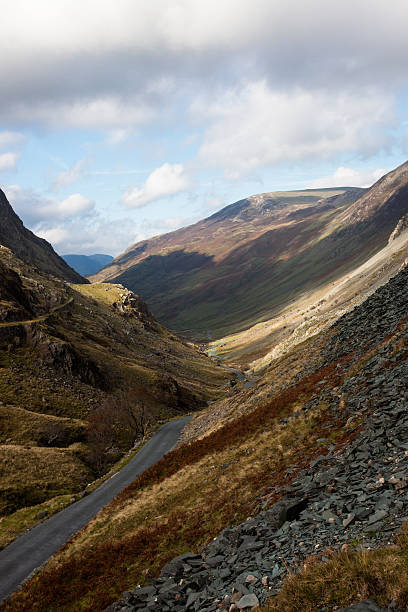 Lake District - Honister Pass Cumbria Honister Pass, winding road in the lake district, near to Honister slate mine slate ridge stock pictures, royalty-free photos & images