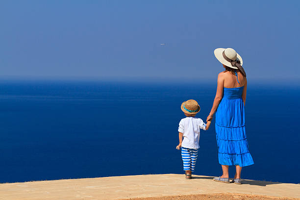 istock mother and son on sea vacation 454049671