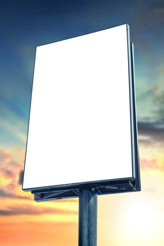 Blank billboard against sunset sky, for more billboard visit our portfolio