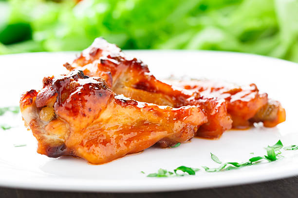 istock Chicken wings with honey sauce 454053561