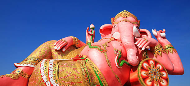istock Pink ganesha statue in relax gesture 454057591