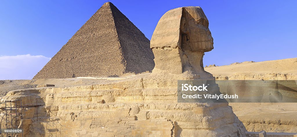 Situato a piramide e la Sfinge di Giza. Panorama - Foto stock royalty-free di Antico - Condizione