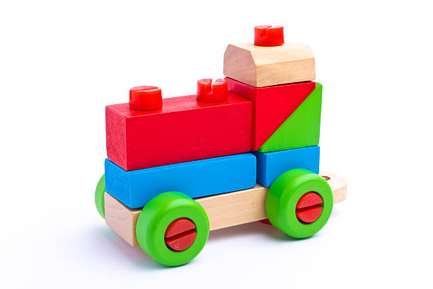 istock Colorful wooden toy train isolated on white background 454065689
