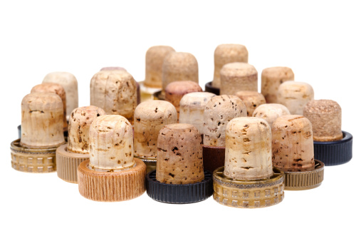 used corks from alcoholic spirits isolated on white background