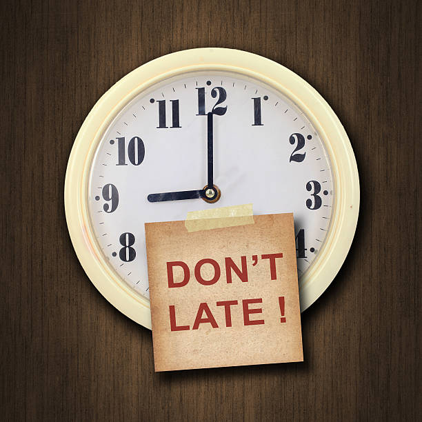 istock wall clock on the wood background 454091553