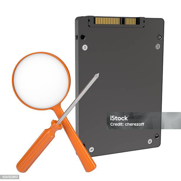 Solidstate Drive Magnifier And Screwdriver Stock Photo - Download Image Now - Computer Part, Concepts, Concepts & Topics