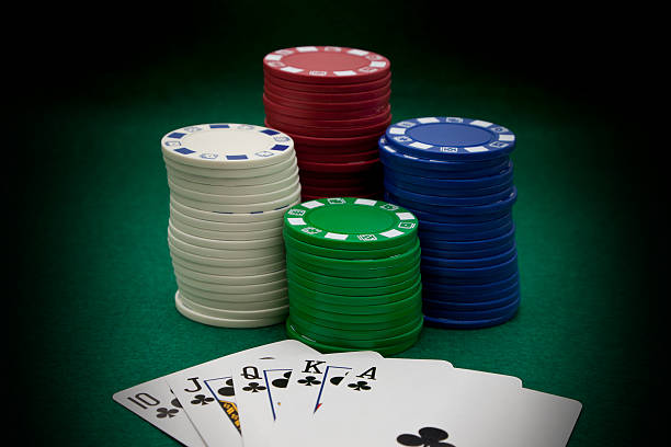 Gambling chips with royal flush stock photo