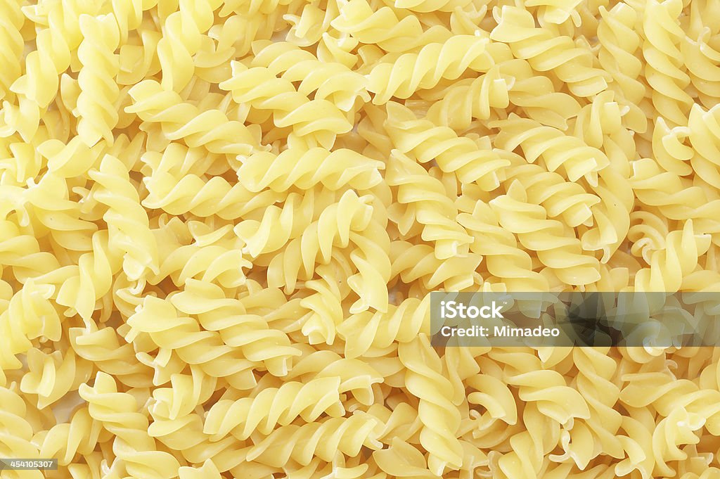 Hintergrund mit Nahaufnahme der spiral fusilli-Nudeln - Lizenzfrei Ausgedörrt Stock-Foto