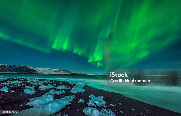 Aurora Over Ice Beach Stock Photo - Download Image Now - Aurora Polaris, Iceland, Aurora Borealis