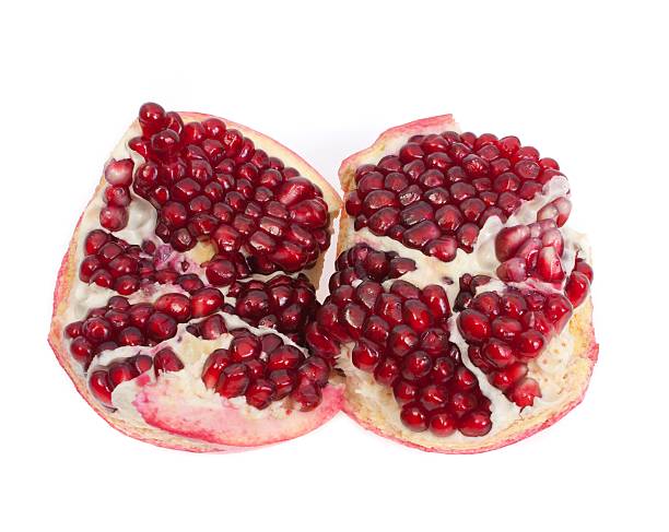 istock Two halves of pomegranate 454107289