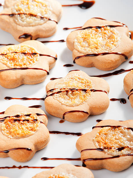 istock Cookies with chocolate toppling 454123197