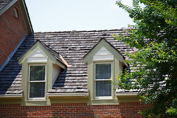 istock Two Dormers on Brick Homes with Wood Shingles 454124521