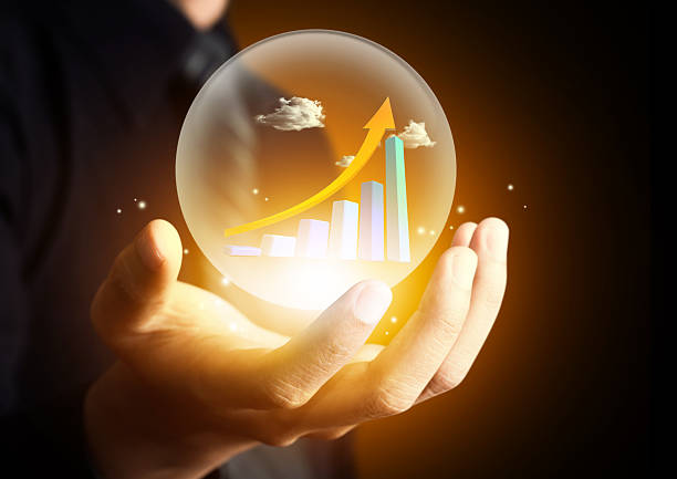Business hand holding hot chart Business hand holding chart in crystal ball fortune telling stock pictures, royalty-free photos & images