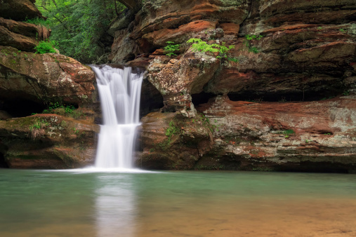 The Upper Falls at Old Man's Cave in Ohio's Hocking Hills State Park flows full with spring rains.