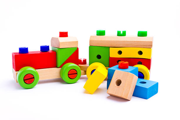 istock Colorful wooden toy train isolated on white background 454132441